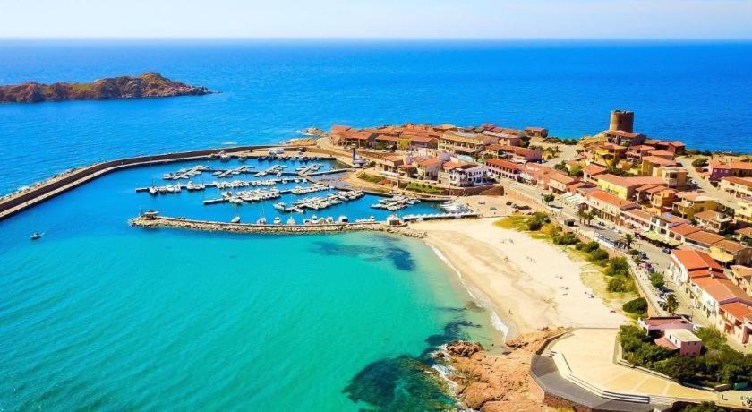 Relax Family House Al Mare Apartamento Isola Rossa Exterior foto